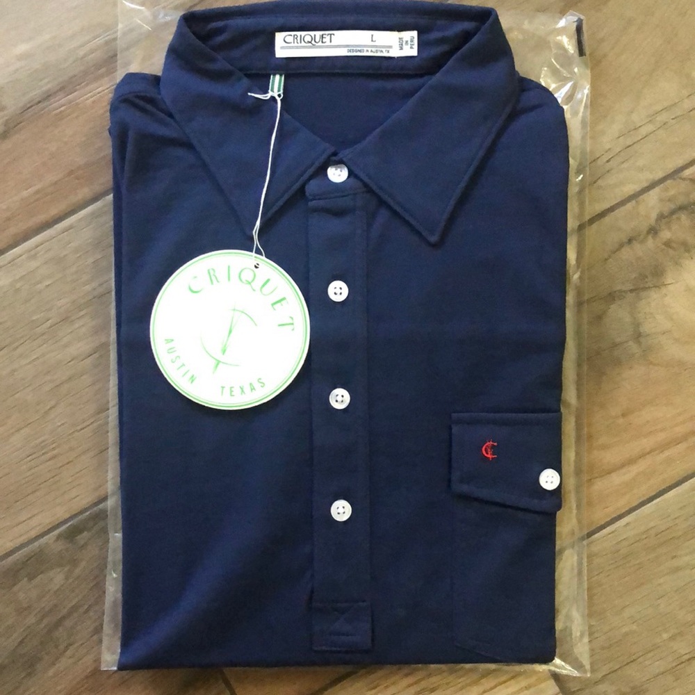 Criquet brand polo shirt, blue short sleeve